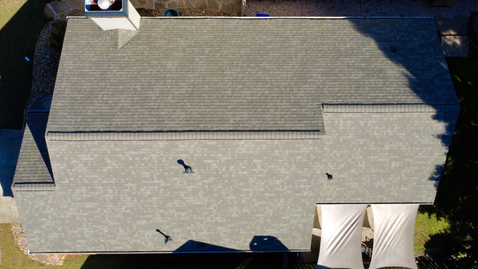Completed architectural shingle roof, drone view