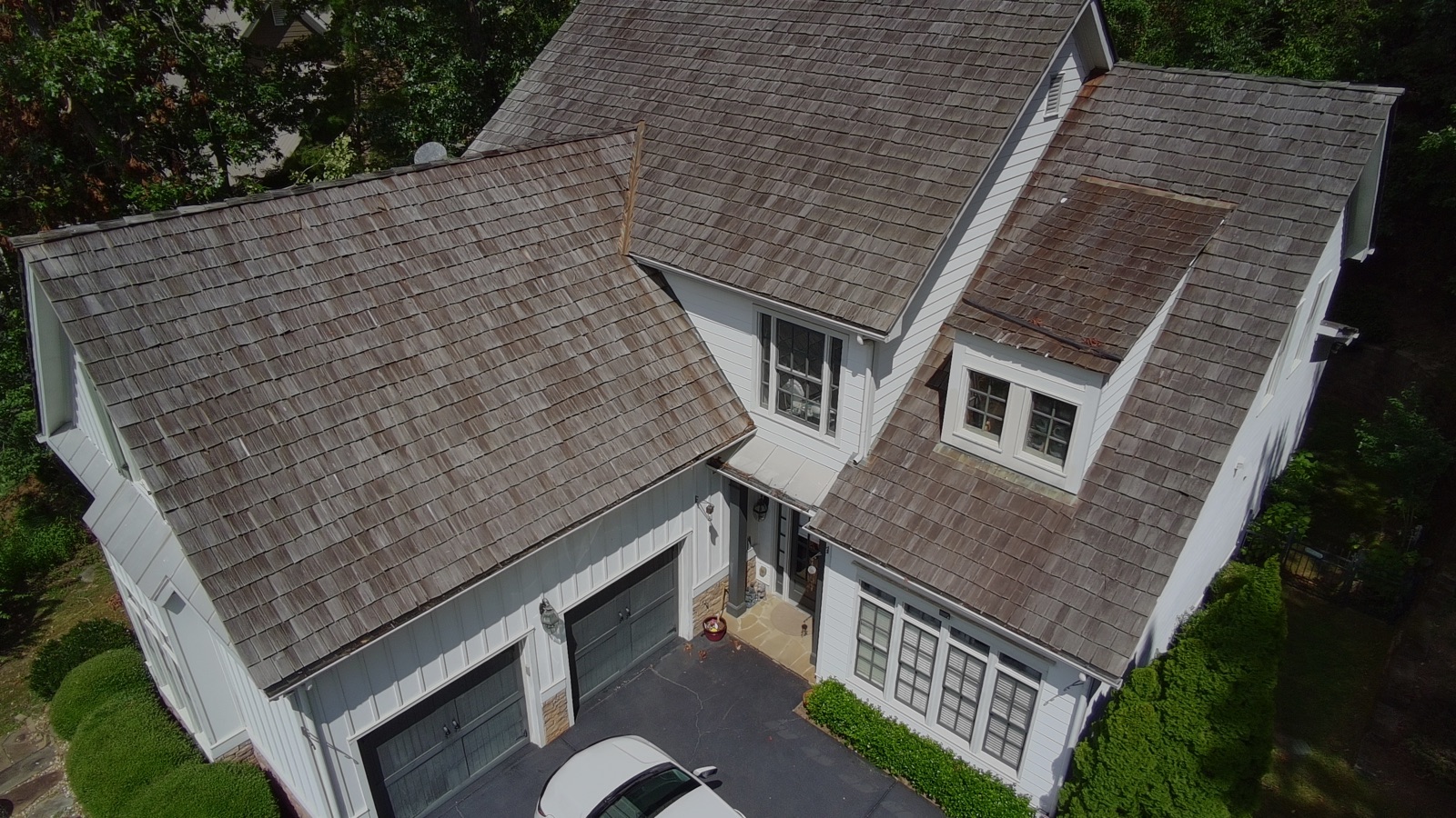 Weathered wood shake roof before replacement